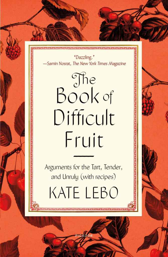 The cover of The Book of Difficult Fruit, featuring the title on an embellished cream-colored card atop a background of stylized fruits and branches and berries in a rose-colored hue.
