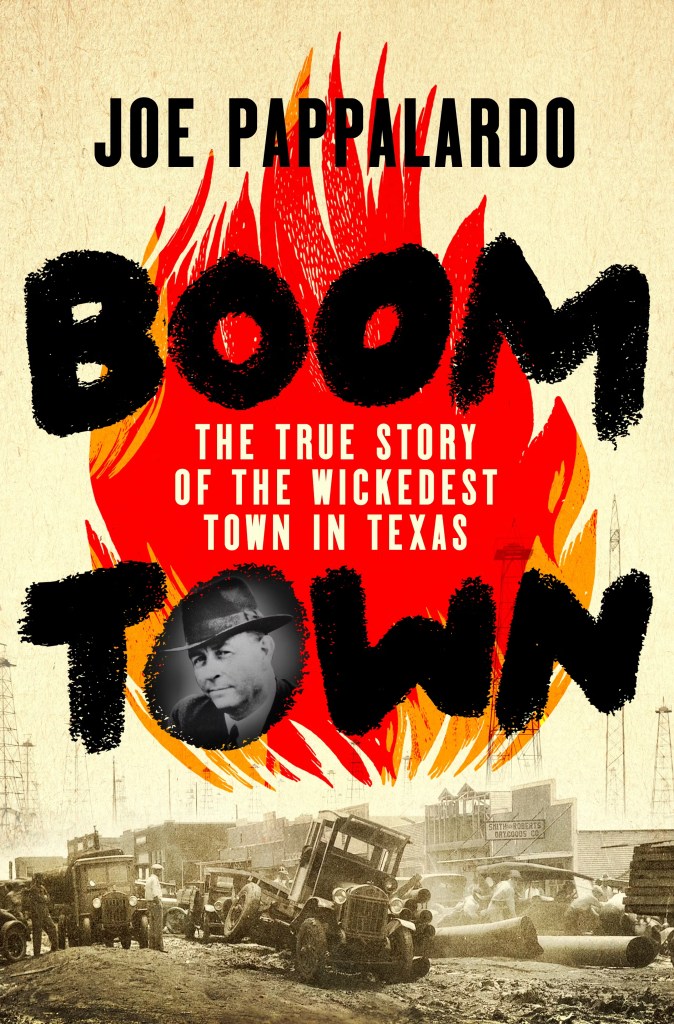 The cover of Joe Pappalardo's Boomtown, featuring an illustrated flame over a sepia-toned photo of crashed 1920s-era cars on a dirt city street.